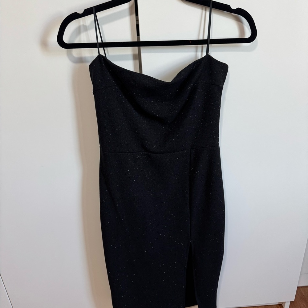Sparkly black strapless dress with leg slit